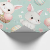 Schattigee kleine paaskonijntjes met paaseieren cadeaupapier (Hoek)