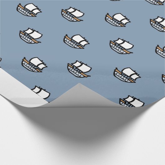 Schattigee kleine schepen op blauw cadeaupapier (Hoek)