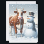Schattigee koe en sneeuwman in het winterveld feestdagenkaart<br><div class="desc">.</div>