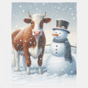 Schattigee koe en sneeuwman in het winterveld fleece deken