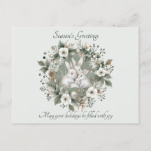 Schattigee konijnen in een bloemige winterkrans