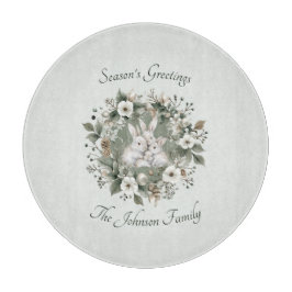 Schattigee konijnen in een bloemige winterkrans snijplank