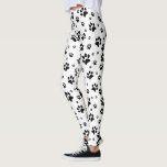 Schattigee Leuke Zwart & Wit Paw Print Leggings<br><div class="desc">Deze leuke leggings zijn ideaal voor honden- en kattenliefhebbers. Ze hebben een schattig patroon met zwarte pootafdrukken verspreid over een witte achtergrond. Leuk grillig design is ideaal voor ouders en dierenvrienden.</div>