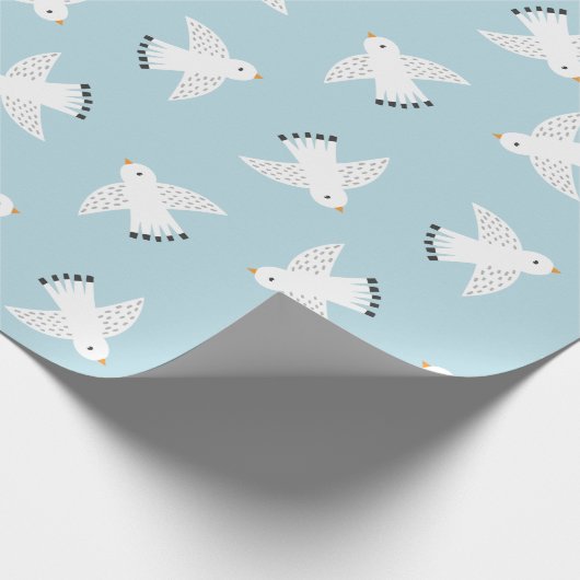 Schattigee meeuwen op lichtblauw cadeaupapier (Hoek)
