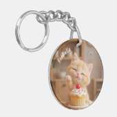 Schattigee Oranje Kitten met een Cupcake Sleutelhanger (Voorkant Links)