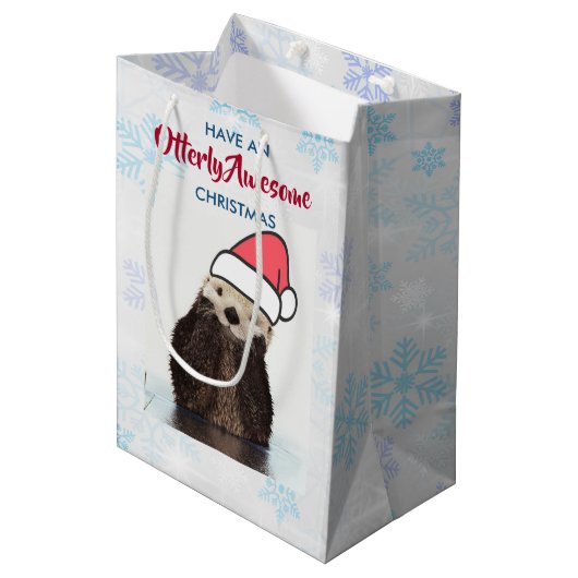 Schattigee otter met een kerstmuts medium cadeauzakje (Voorkant Gekanteld)