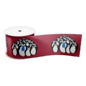 Schattigee pinguïn familie op kerstrood satijnen lint (Spoel)