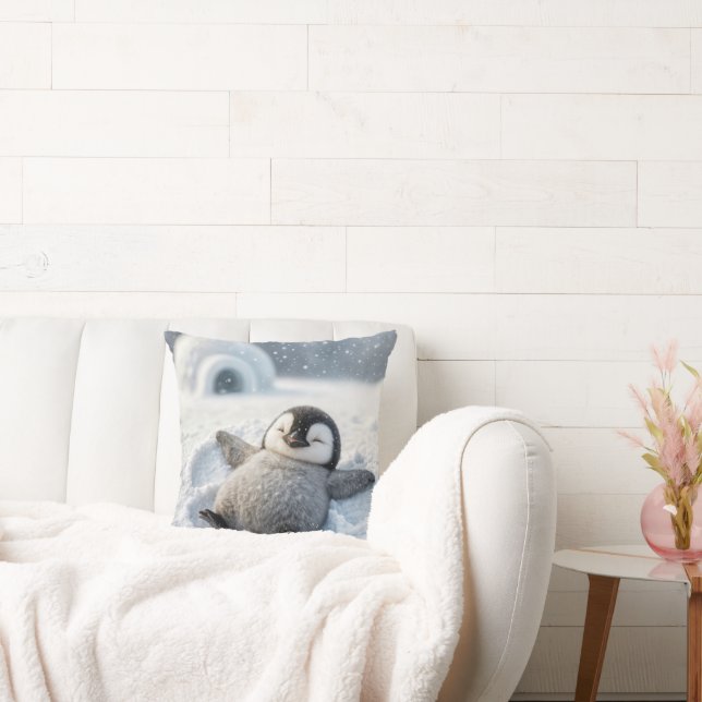 Schattigee pinguïn kuiken maken van een sneeuwenge kussen (Bank)