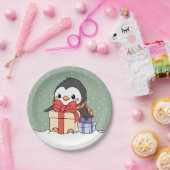 Schattigee pinguïn met kerstcadeaus in de sneeuwva papieren bordje (Feest)