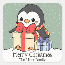 Schattigee pinguïn met kerstcadeaus in de sneeuwva vierkante sticker