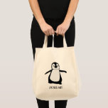 Schattigee Pinguïn Zwart Wit Gepersonaliseerd Tote Bag<br><div class="desc">Voeg een vleugje plezier en zoetheid toe aan je accessoires met deze gepersonaliseerde canvas tas met een schattige pinguïnillustratie in zwart-wit. Pas het aan met een naam om een uniek en attent cadeau voor kinderen of pinguïnliefhebbers te creëer. Perfect voor dagelijks gebruik, dit leuke tas combineert stijl en functionaliteit, waardoor...</div>
