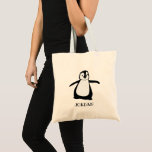 Schattigee Pinguïn Zwart Wit Gepersonaliseerd Tote Bag<br><div class="desc">Voeg een vleugje plezier en zoetheid toe aan je accessoires met deze gepersonaliseerde canvas tas met een schattige pinguïnillustratie in zwart-wit. Pas het aan met een naam om een uniek en attent cadeau voor kinderen of pinguïnliefhebbers te creëer. Perfect voor dagelijks gebruik, dit leuke tas combineert stijl en functionaliteit, waardoor...</div>