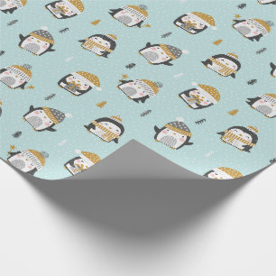Schattigee pinguïns met kleine boompjes op lichtbl cadeaupapier