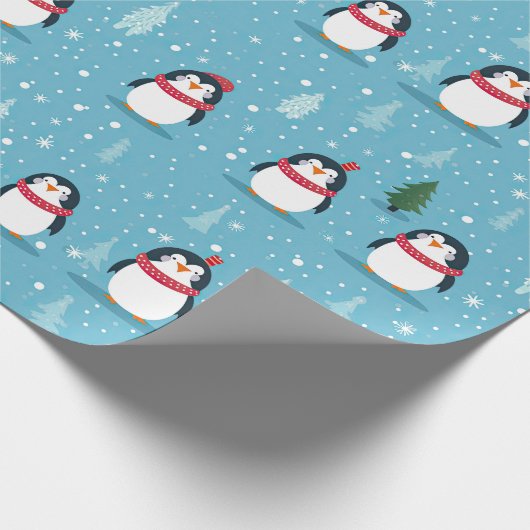 Schattigee pinguïns op lichtblauw met sneeuwvlokke cadeaupapier (Hoek)