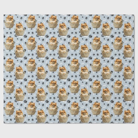 Schattigee Pomeranian Puppy in Basket Paw Print Cadeaupapier (Vlak)
