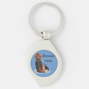 Schattigee puppyhond Beagle knuffelt zijn moeder Sleutelhanger