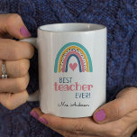 Schattigee regenboog beste leraar ooit koffiemok<br><div class="desc">Deze leraar koffie mok bevat de tekst "beste LERAAR ooit" en is geaccentueerd met een leuke en kleurrijke regenboog en hart in moderne kleuren van blauwgroen,  goud,  roze en blauw. Het is een perfect lerarencadeau.</div>