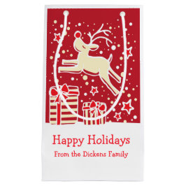 Schattigee rendieren die over de zak van Kerstmisg Klein Cadeauzakje