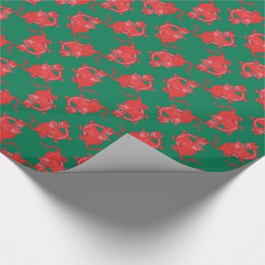 Schattigee rode draken op donkergroen inpakpapier (Hoek)