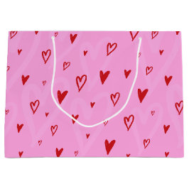 Schattigee rode hartjes op roze achtergrond groot cadeauzakje
