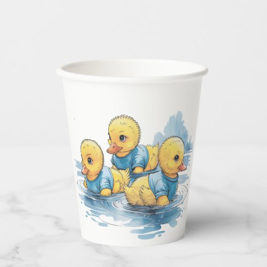 Schattigee rubberen eend in blauwe kleding papieren bekers (Voorkant)