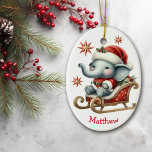 Schattigee Santa Elephant Sleigh Kinder Kerst Keramisch Ornament<br><div class="desc">Op de voorkant van dit schattige kinderen kerstornament is een schattig baby panda beer zittend in een rode en gouden slee. Hij draagt een rode en witte kerstmuts en een kerstpak. Rode en gouden decoratieve sterren zijn verspreid over, en uw aangepaste naam is aan de onderkant. De achterkant van het...</div>