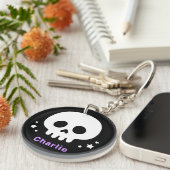 Schattigee schedel met sterretjes en paarse naam sleutelhanger (Voorkant Rechts)