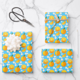 Schattigee sinaasappels en witte bloemen inpakpapier vel