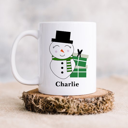 Schattigee sneeuwman met groene kerstcadeaus koffiemok