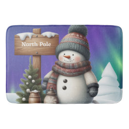 Schattigee sneeuwman op Noordpool met noorderlicht Badmat