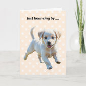 Schattigee stuiterende puppy met pootafdrukken wor kaart (Voorkant)