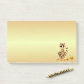 Schattigee Tiger Cat Cartoon op Golden Post-it® Notes (Op bureau)