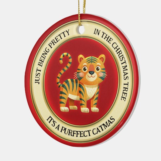 Schattigee tijgerkat geïllustreerd met kerst keramisch ornament (Links)
