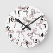 Schattigee trendy roze lintbogen geschetst in zwar ronde klok (Voorkant)