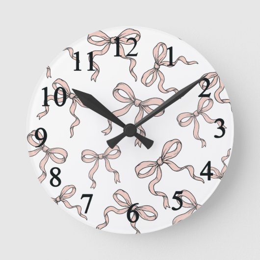 Schattigee trendy roze lintbogen geschetst in zwar ronde klok (Voorkant)