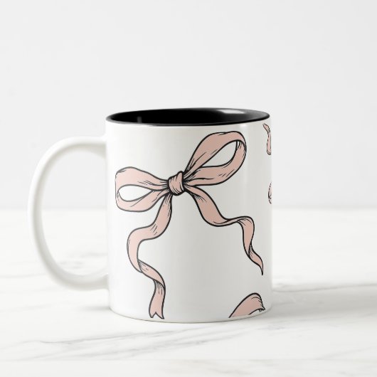 Schattigee trendy roze lintbogen geschetst in zwar tweekleurige koffiemok (Links)