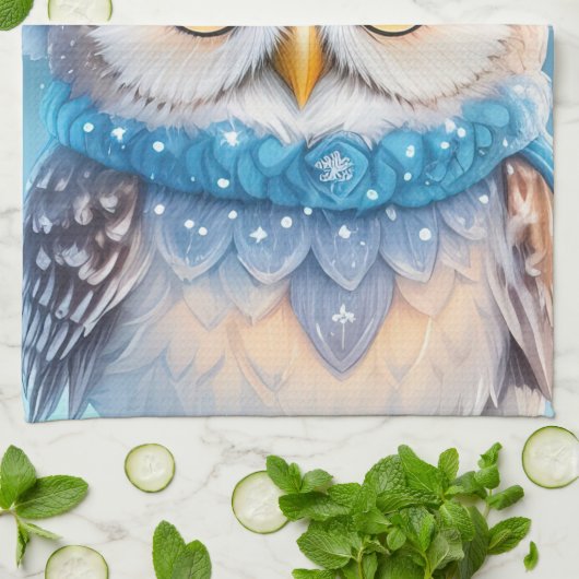 Schattigee uil met een blauw pet theedoek (Gevouwen)