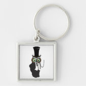 Schattigee uil met monocle sleutelhanger (Voorkant)