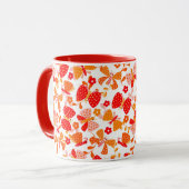 Schattigee vlinder in een bloementuin in rood sina mok (Voorkant links)