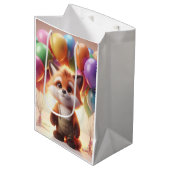Schattigee vos omringd door kleurrijke ballonnen. medium cadeauzakje (Voorkant Gekanteld)