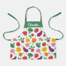 Schattigee vrolijke kleurrijke groenten op witte a schort