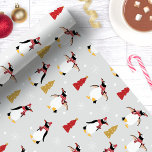 Schattigee winterpinguïnkerst cadeaupapier<br><div class="desc">Wikkel je kerstcadeaus in met een vleugje winterplezier met dit schattige kerstinpakpapier met pinguïnthema. Met schattige pinguïns in feestelijke sjaals, samen met charmante vakantiebomen en sneeuwvlokken, is dit ontwerp ideaal om een speelse en gezellige sfeer aan uw cadeaus toe te voegen. Of het nu voor kinderen, familie of vrienden is,...</div>