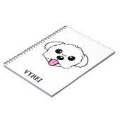 Schattigee witte bichon frise hond stekende tong u notitieboek (Linkerzijde)