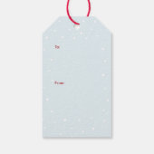 Schattigee witte kersthond die sneeuwengelen maakt cadeaulabel (Achterkant)