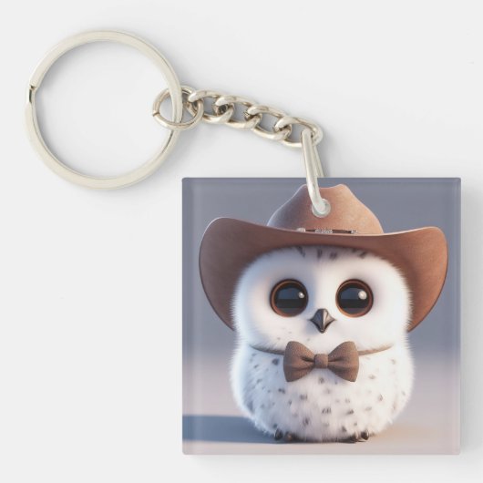 Schattigee witte pluizige uil met een cowboy pet sleutelhanger (voorkant)