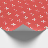 Schattigee witte toetsen op rode achtergrond cadeaupapier (Hoek)