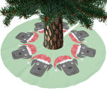 Schattigee zwarte hond in Santa Hat Kerstboom Rok<br><div class="desc">Waterverf schilderij van schattige zwarte honden in feestelijke kerstmanmutsen op een appelgroene achtergrond,  ideaal voor dierenliefhebbers. Originele versie door Nic Squirrell.</div>