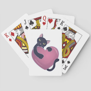 Schattigee zwarte kat die zich vasthoudt aan het g pokerkaarten