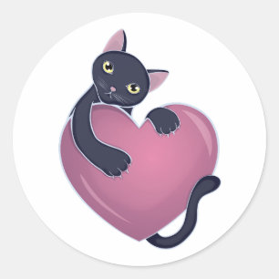 Schattigee zwarte kat die zich vasthoudt aan het g ronde sticker