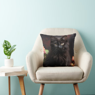Schattigee zwarte kat en bloemen kussen